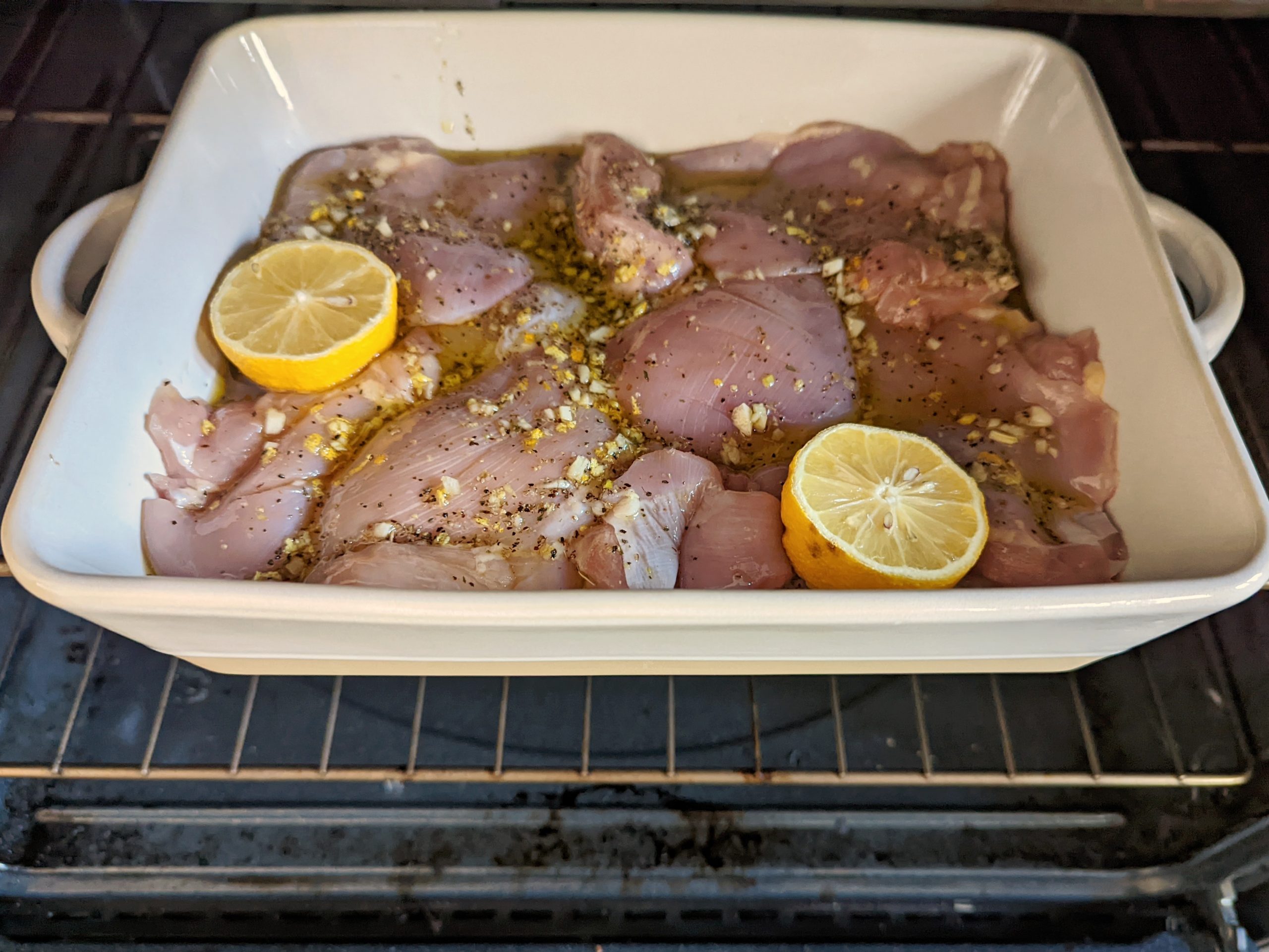 Baked chicken thighs cook in the oven for one hour.