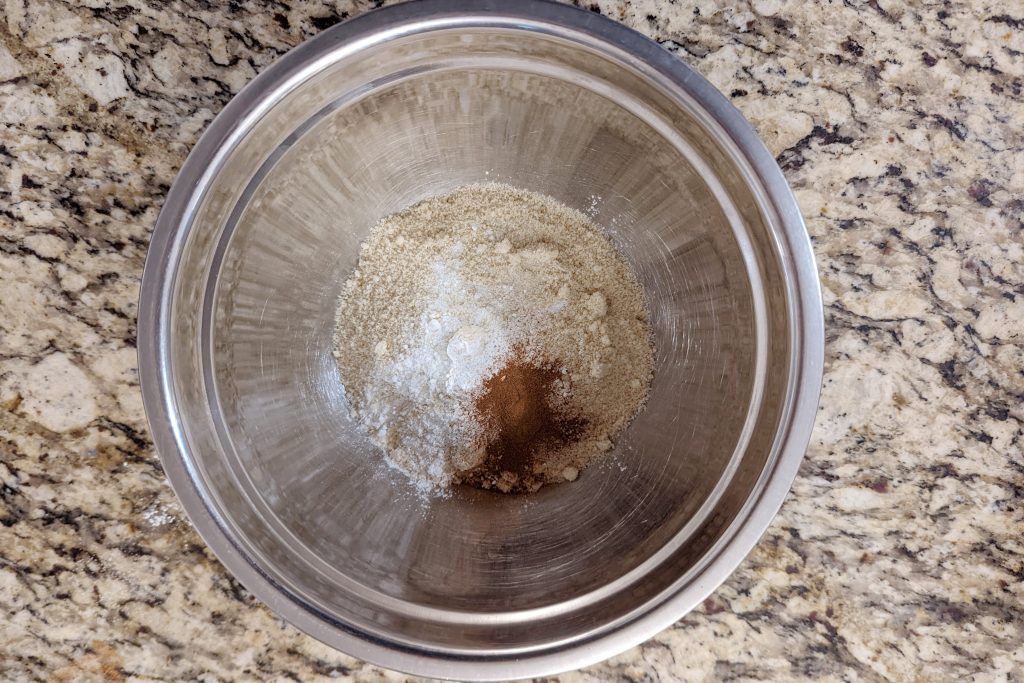 Dry ingredients for almond flour pancakes in a bowl.