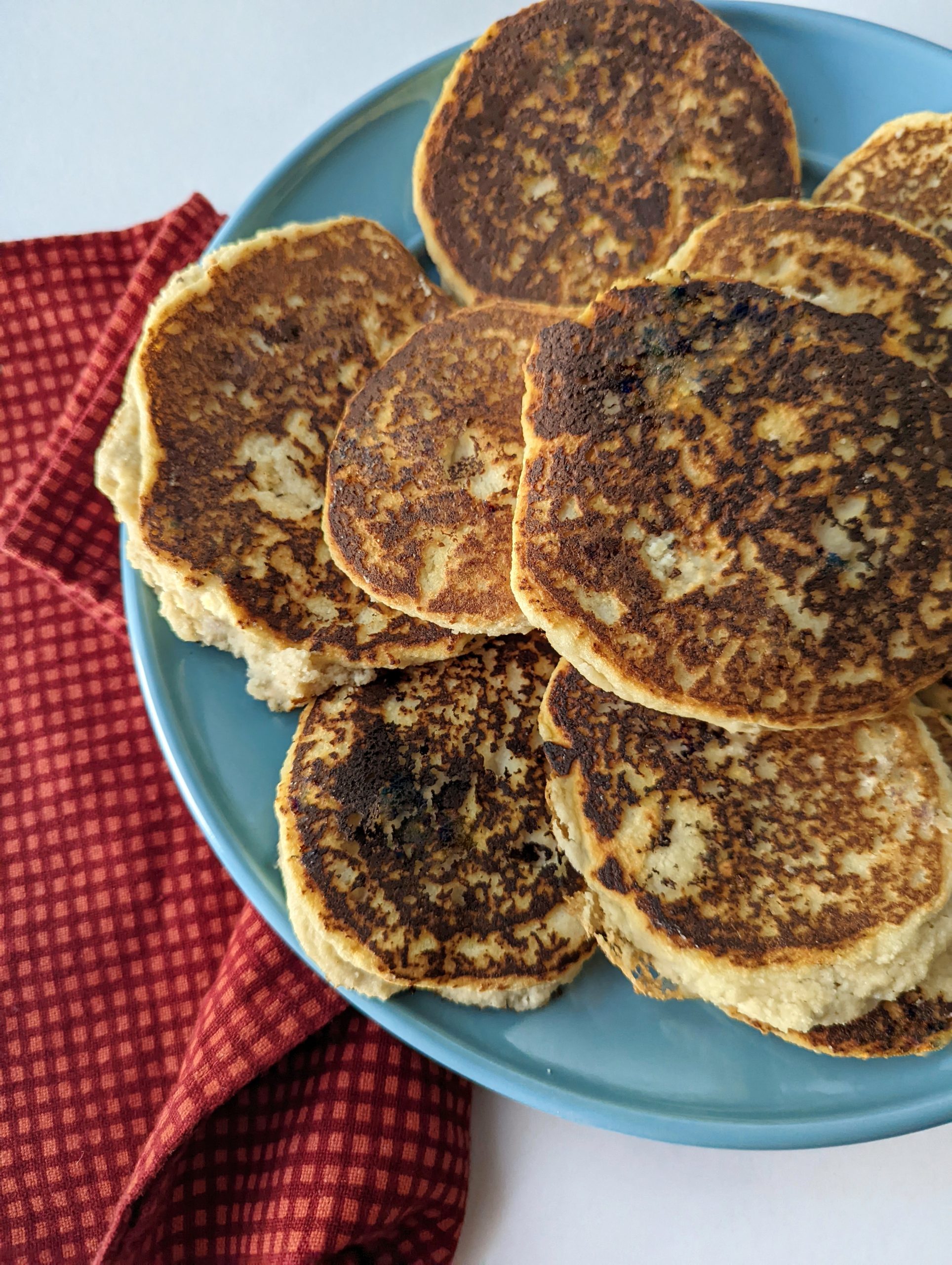 A heaping pile of freshly made almond flour pancakes.