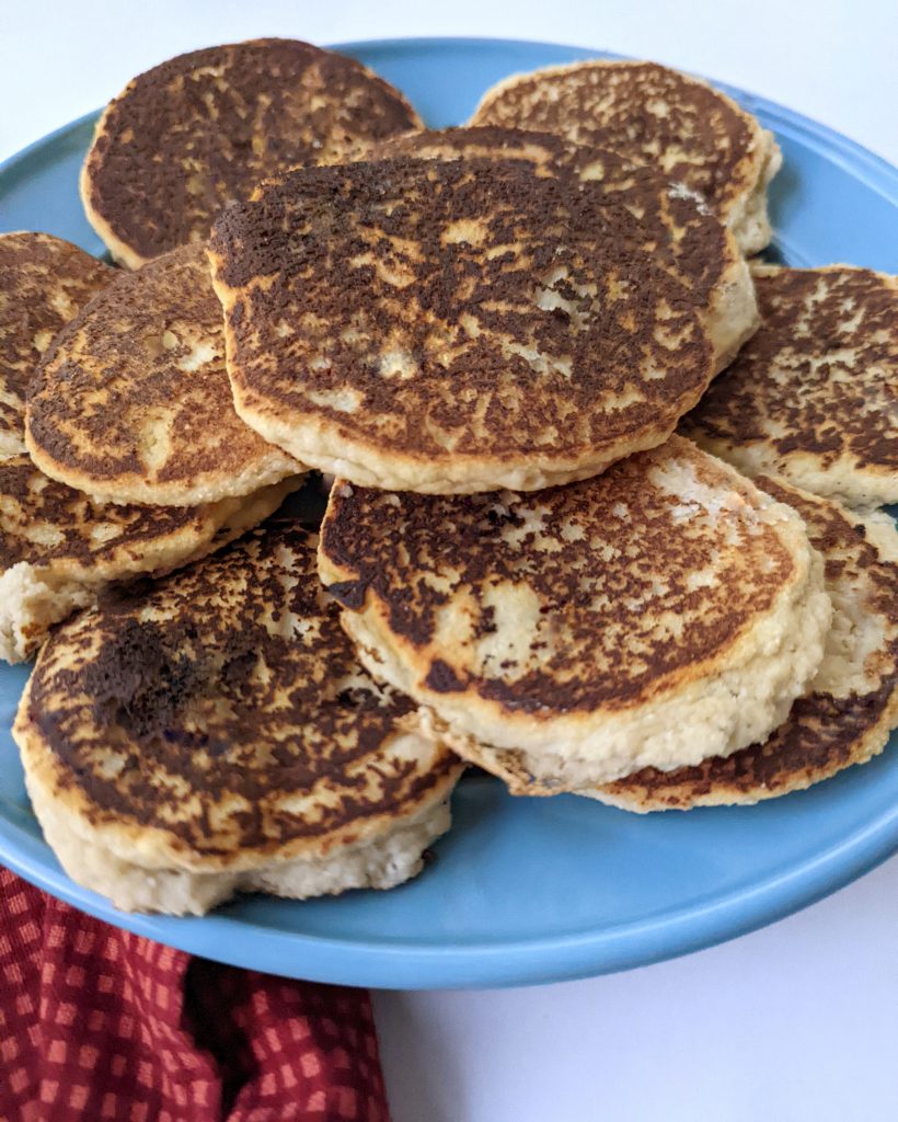 A heaping pile of freshly made almond flour pancakes.