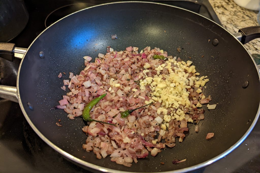 garlic and onions cooking in oil or chana masala