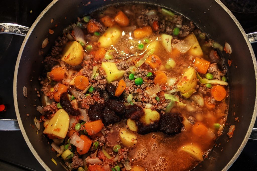 For a boost of flavor, stir Better than bouillon and water to the vegetable beef soup.