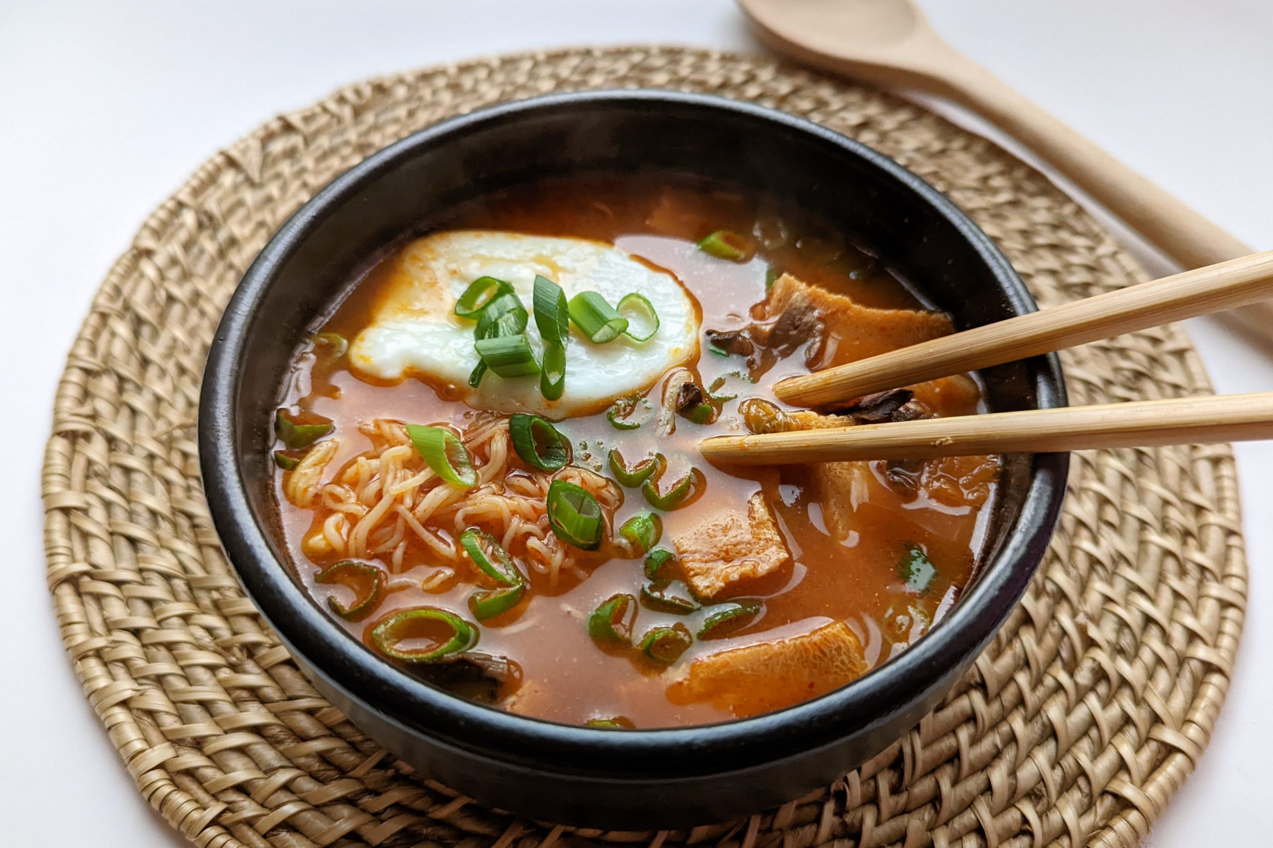 A single serving of Korean Low Carb Ramen topped with scallions.