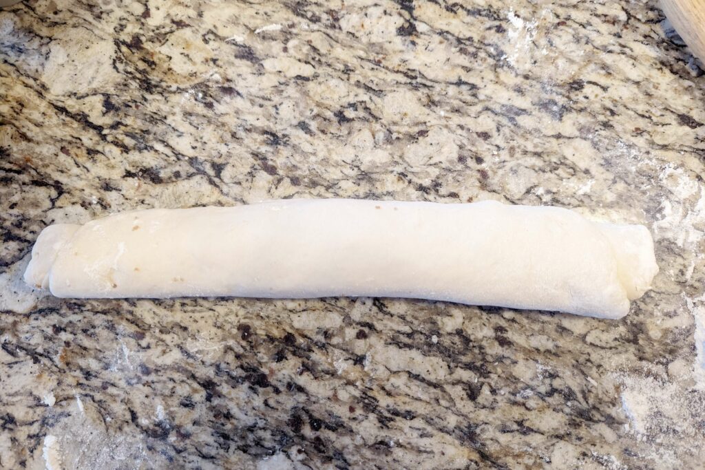 Dough rolled into a long cyclinder.