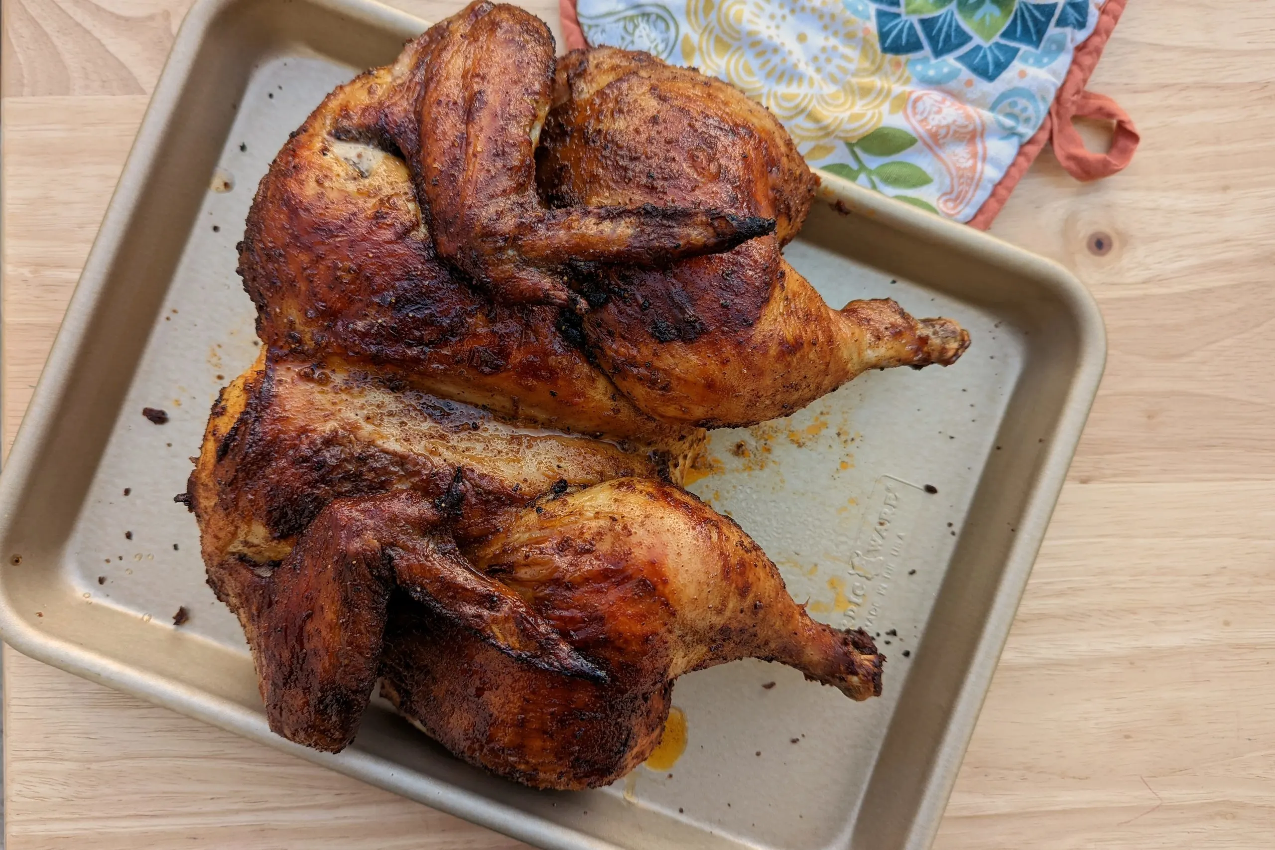A whole roasted Peruvian chicken ready to serv.