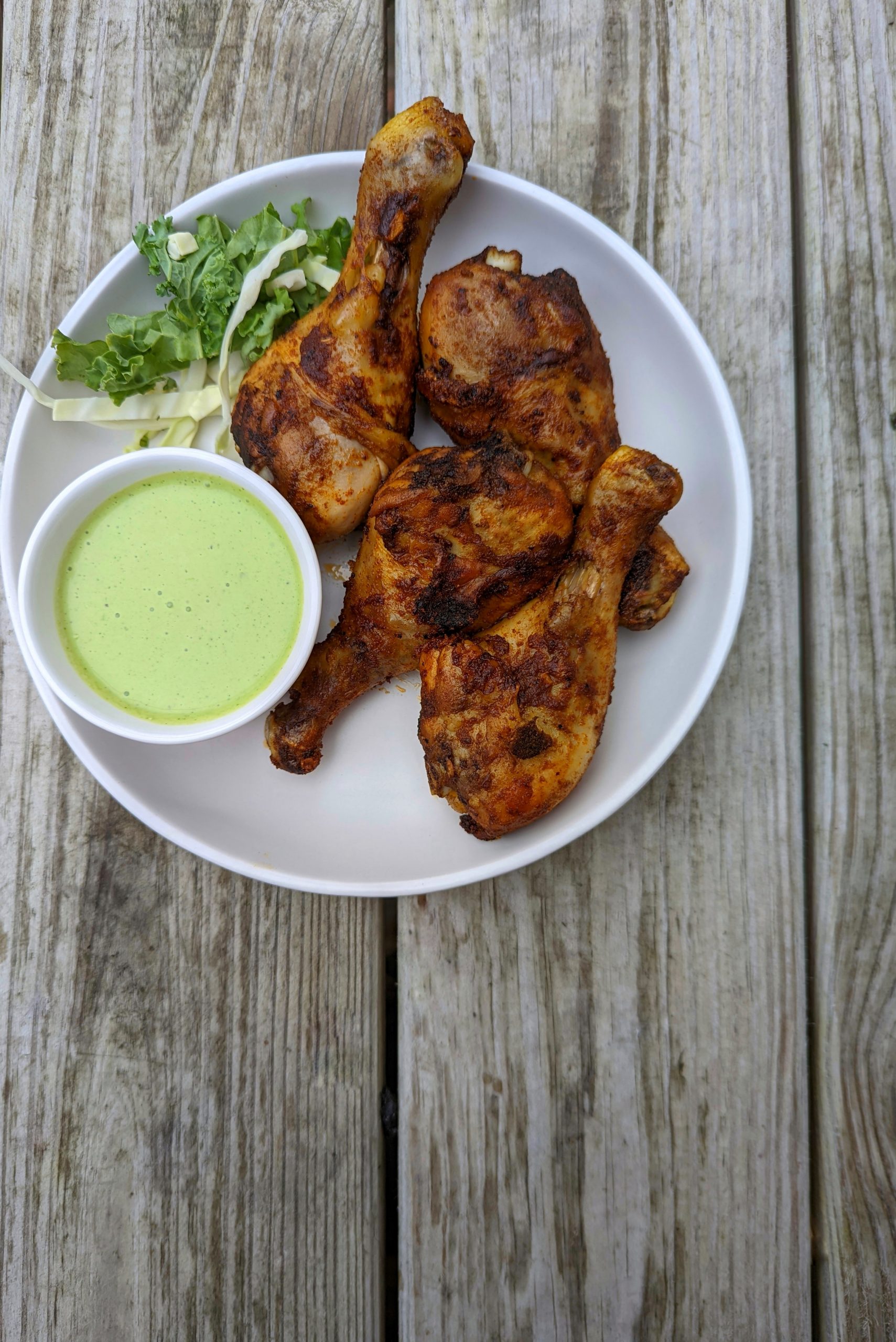 A single serving of our Peruvian roasted chicken served with serrano crema.