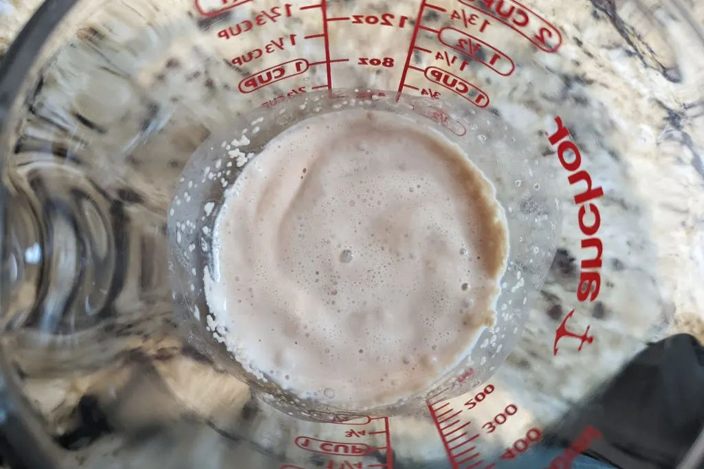 Prepare the active yeast in a measuring cup with sugar and warm water.