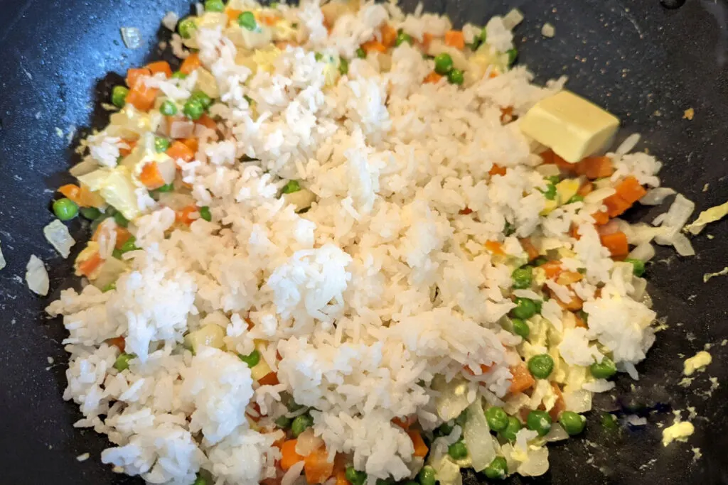 Chilled rice stirred into the vegetables.
