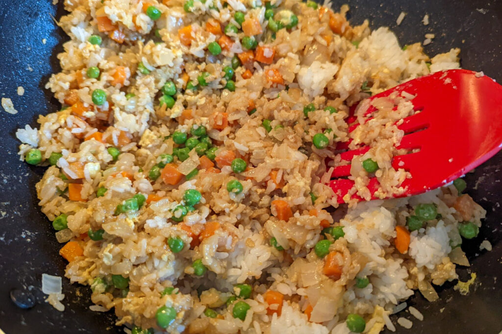 Sauce added to the vegetable fried rice.