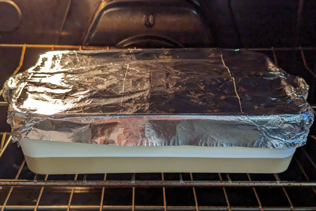 Cover the baking dish with aluminum foil.
