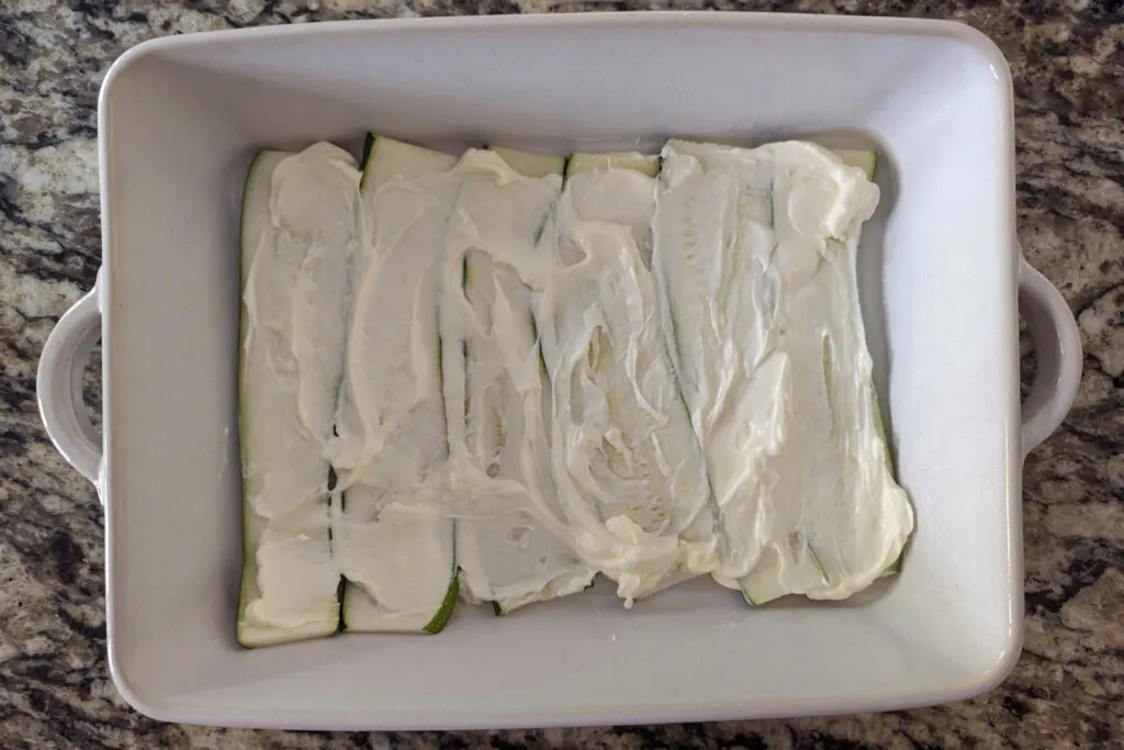 Coat the zucchini with the cream cheese mixture.