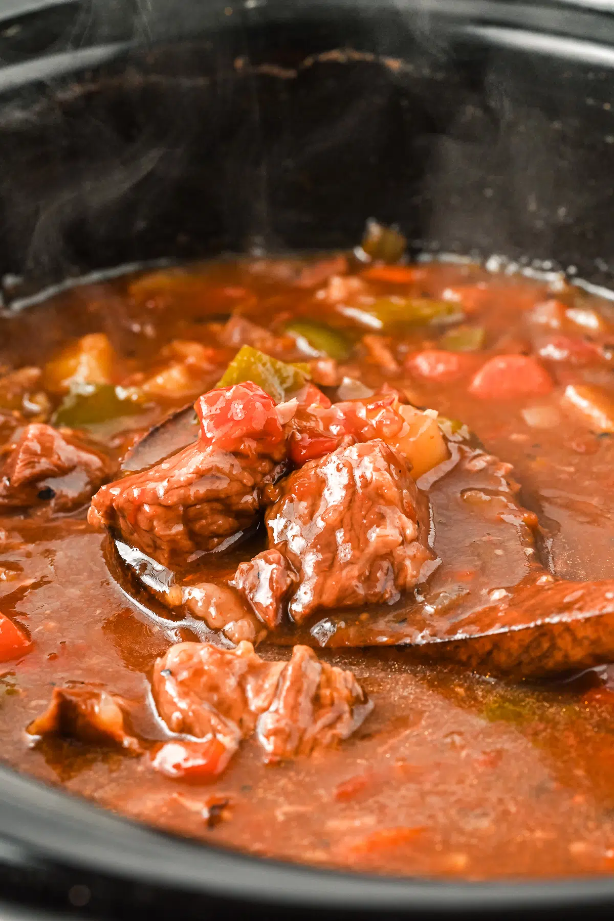 A close up of goulash in a slow cooker.