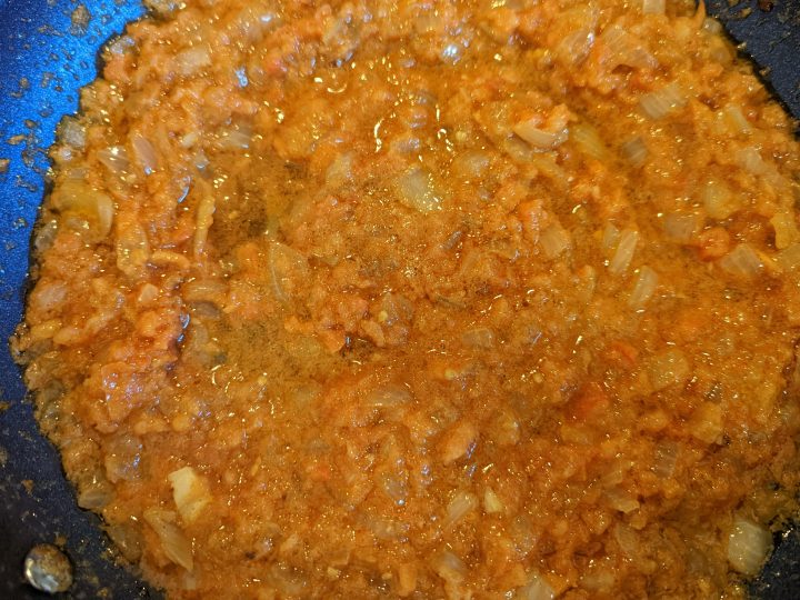add the tomato mixture to the kefta tagine gravy