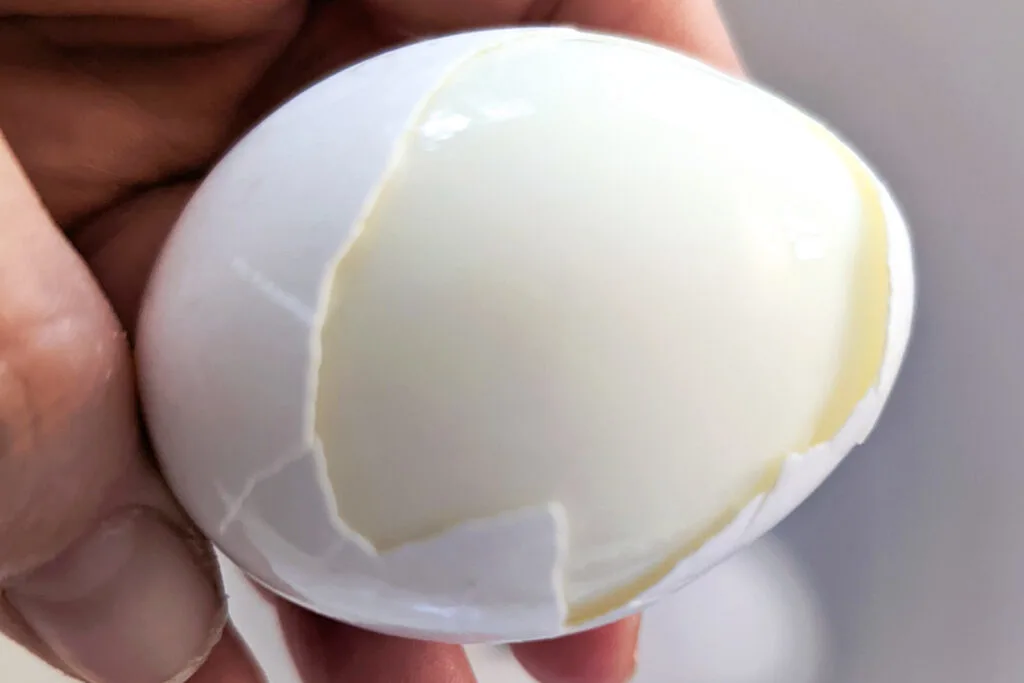 A peeled hard boiled egg.