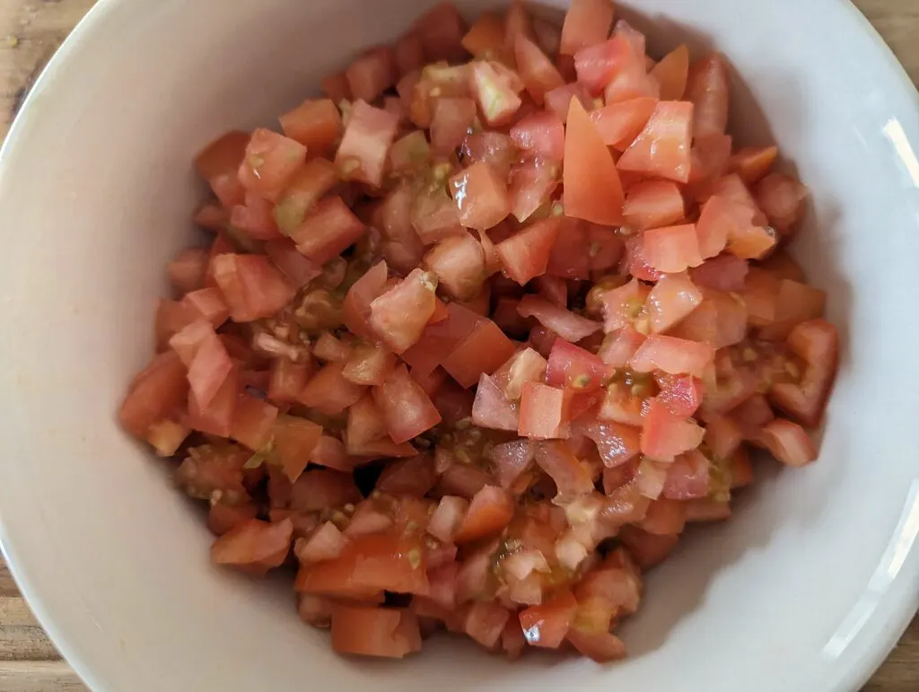 Chopped tomatoes in a bowl.