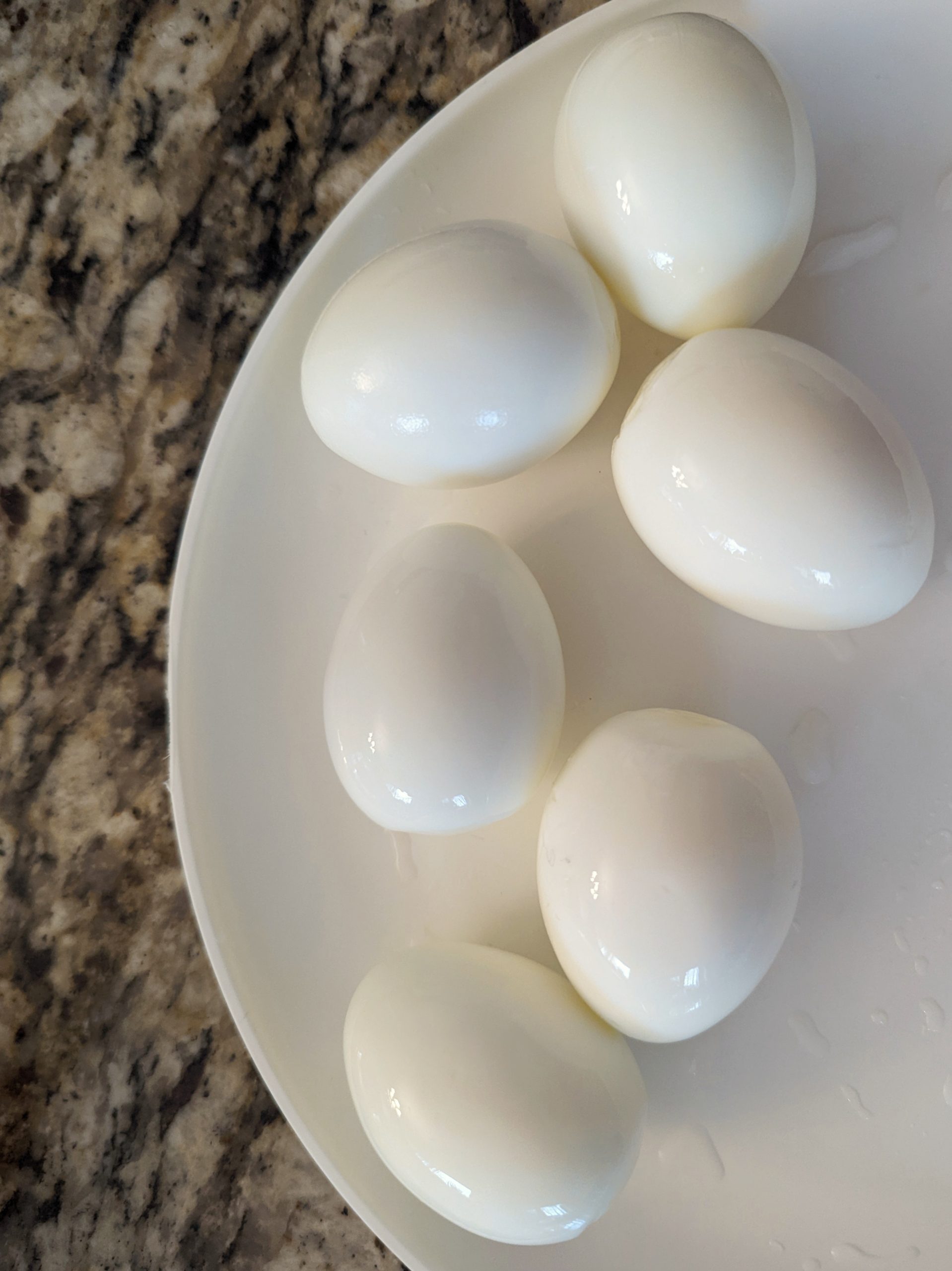 A plate of hard boiled eggs.