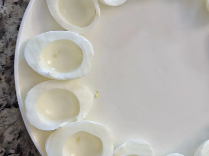 Hard boiled eggs cut in half and yolks removed.