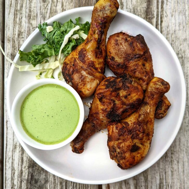 A single serving of our oven baked drumsticks served with serrano crema.