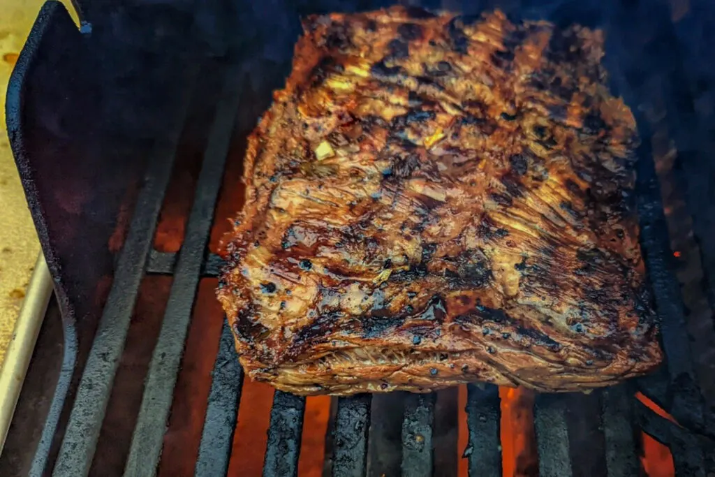 Carne asada searing on the grill.