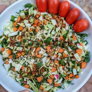 Our chopped salad recipe topped with tomatoes.