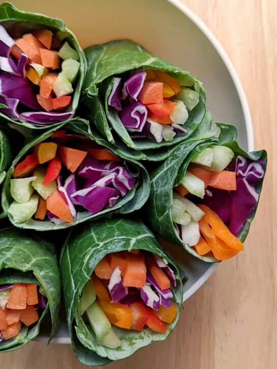 The inside of six rainbow wraps showing the rainbow of vegetables.