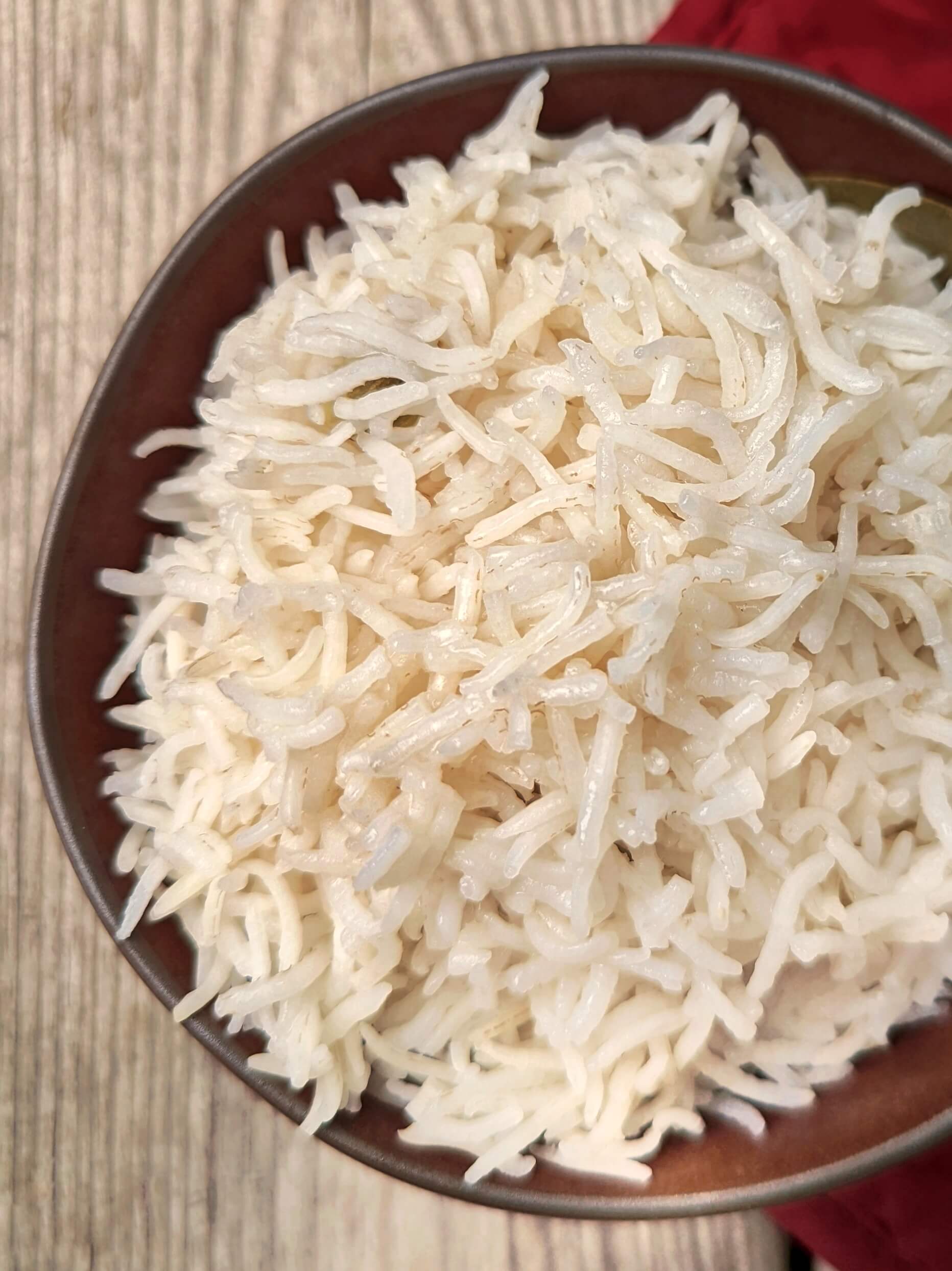 A close up of basmati rice in a bowl.