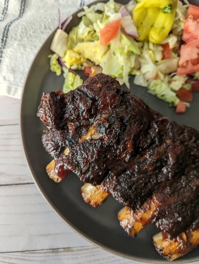 Our beef ribs look tasty with a tossed side salad.