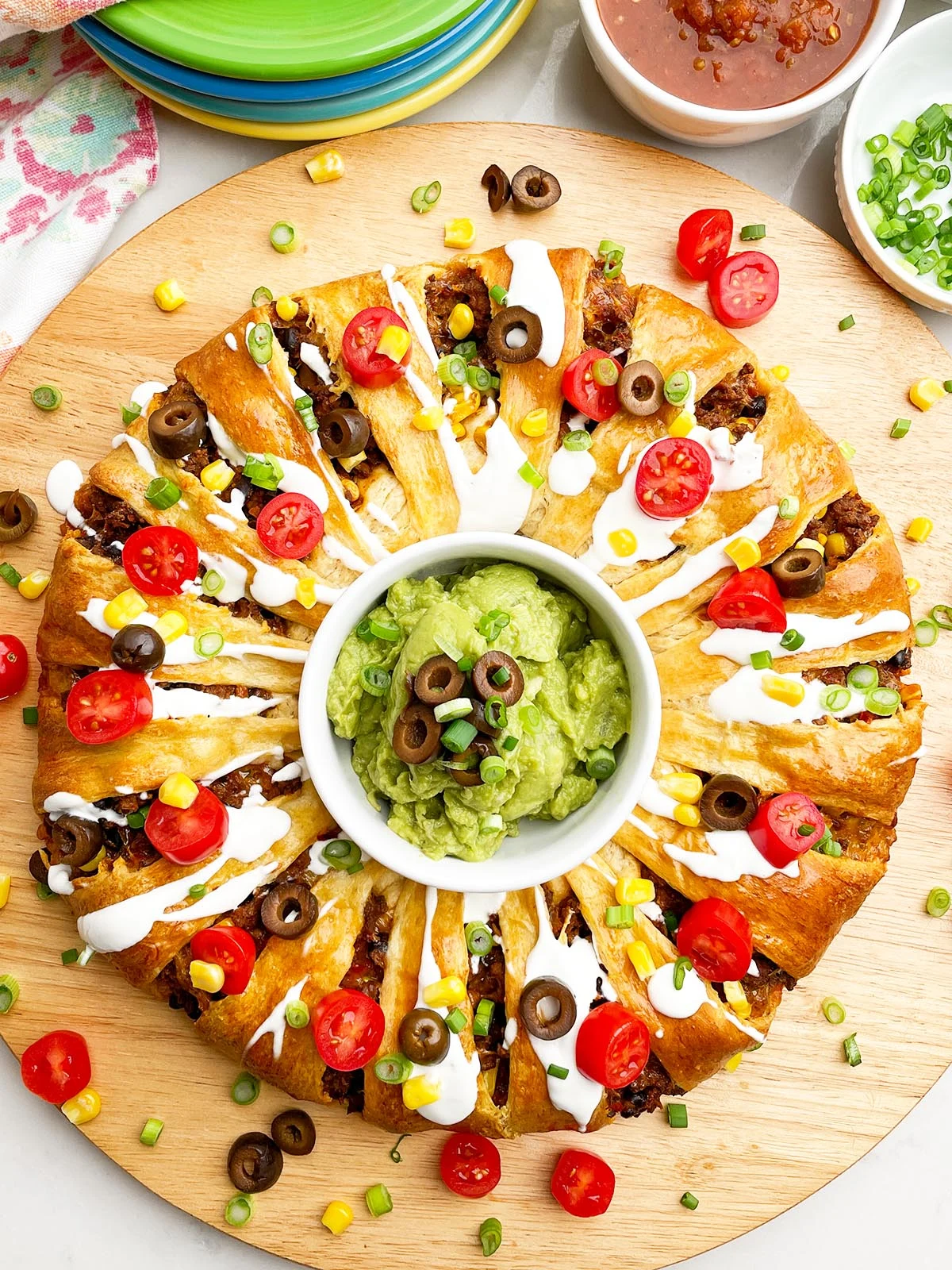 A large taco ring on a serving plate.