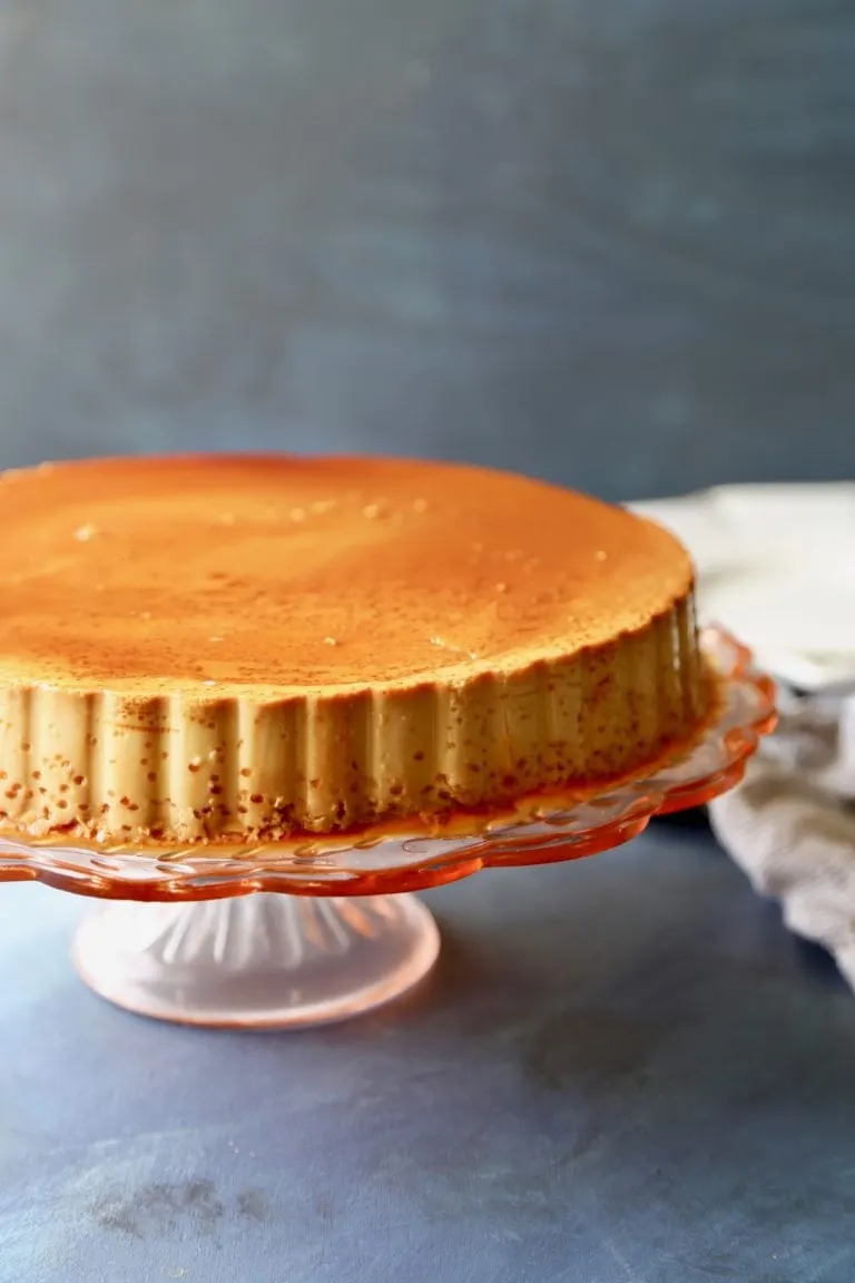 Flan on a cake stand.