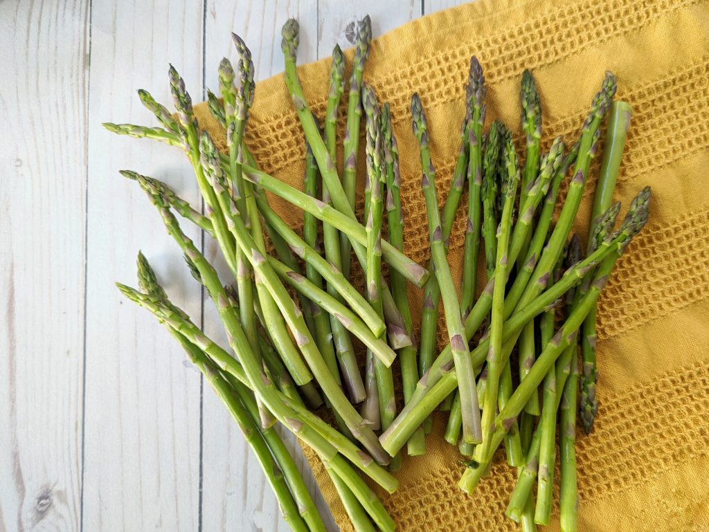 Fresh asparagus in a bowl.