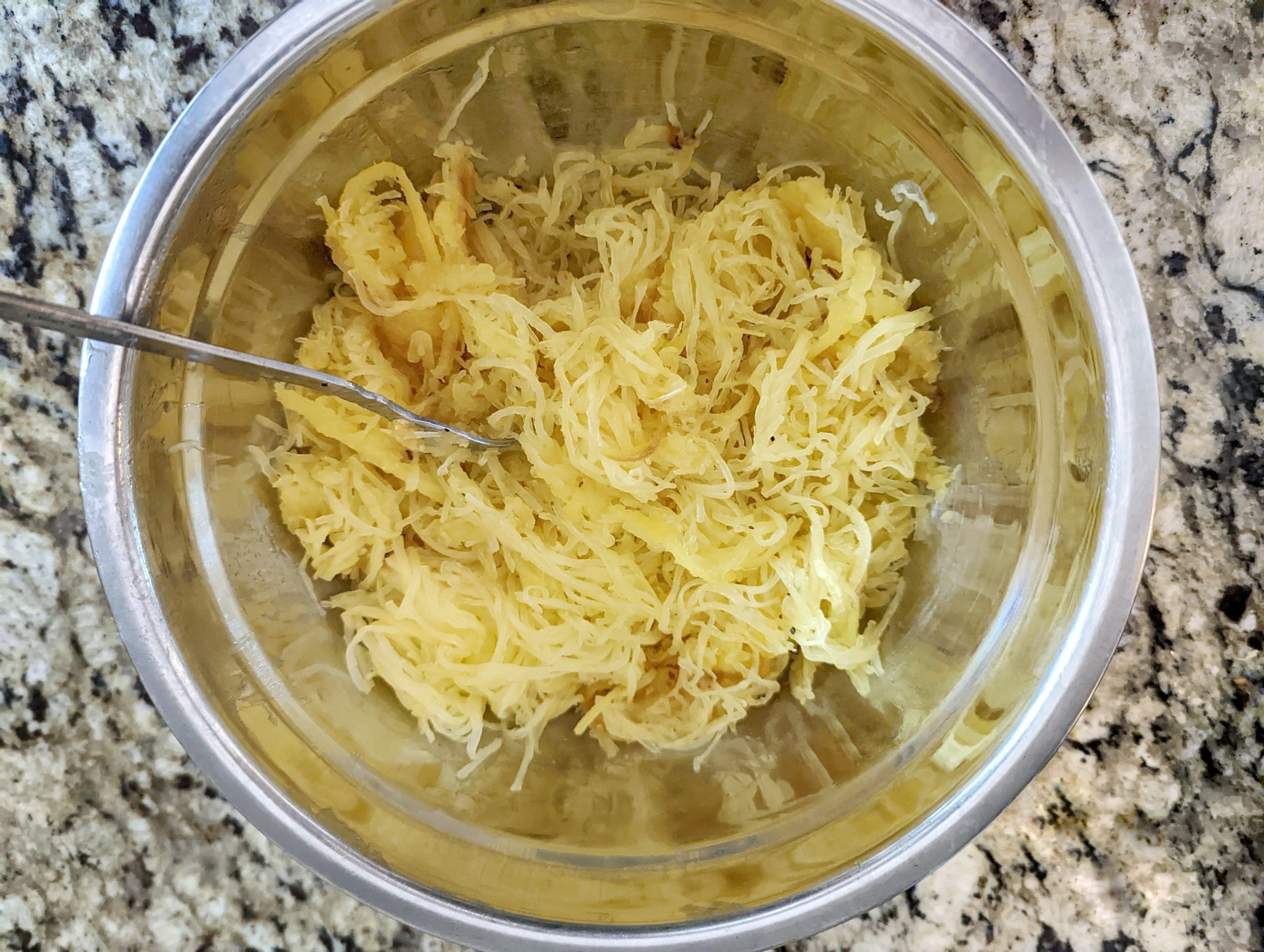 The spaghetti squash pulled and the strands separated.