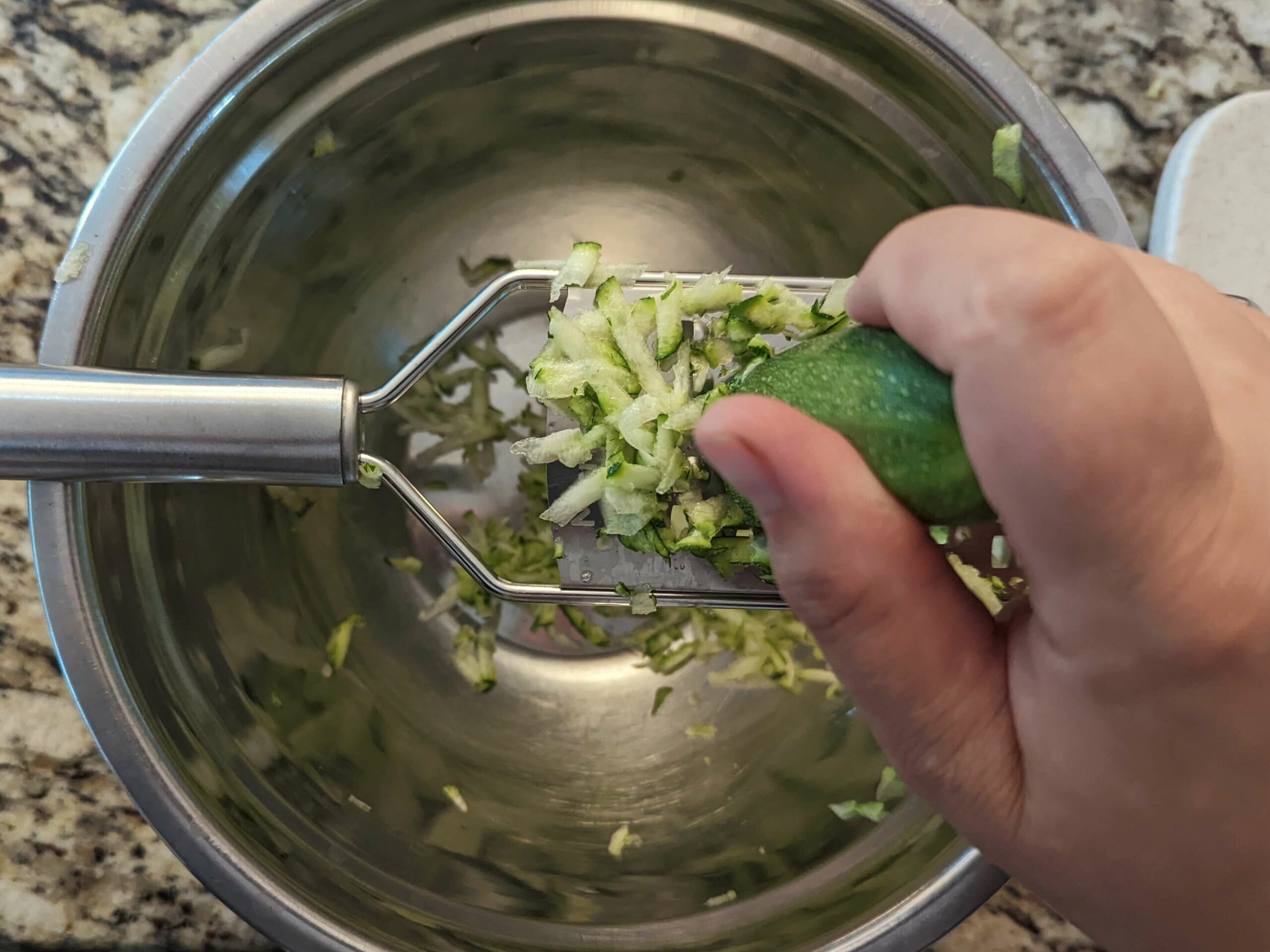 Shred the zucchini.