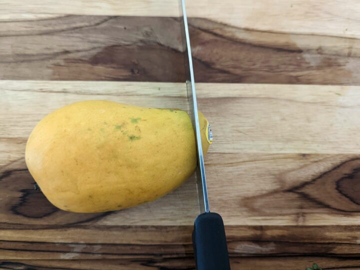 Cut the end off of the mango.