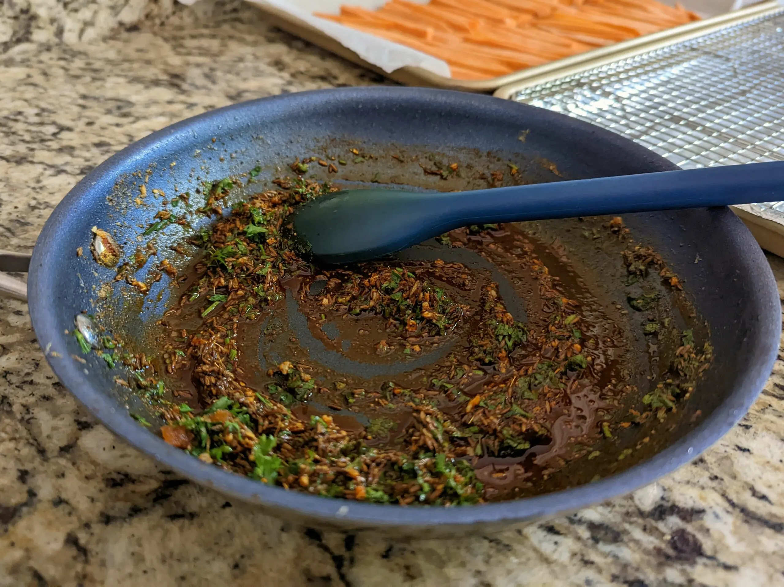 Stir the brown sugar and herbs into the skillet.