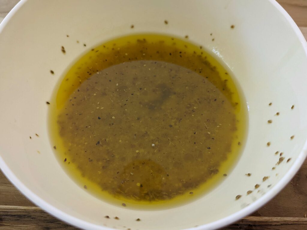 Combine the ingredients for the vinegar dressing in a small bowl.