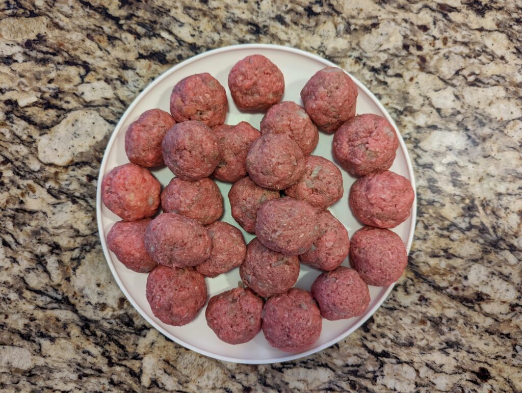 Roll the meatballs.