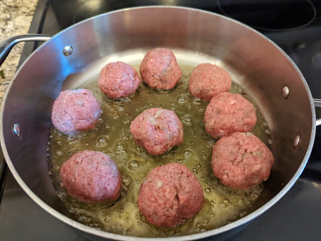 Sear the meatballs.