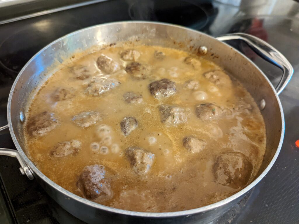 Finish cooking the meatballs in a saute pan.