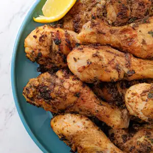 Ras el hanout chicken on a plate.