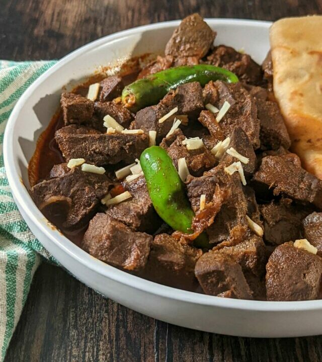 Tender chunks of beef liver topped with chilis and fresh ginger.