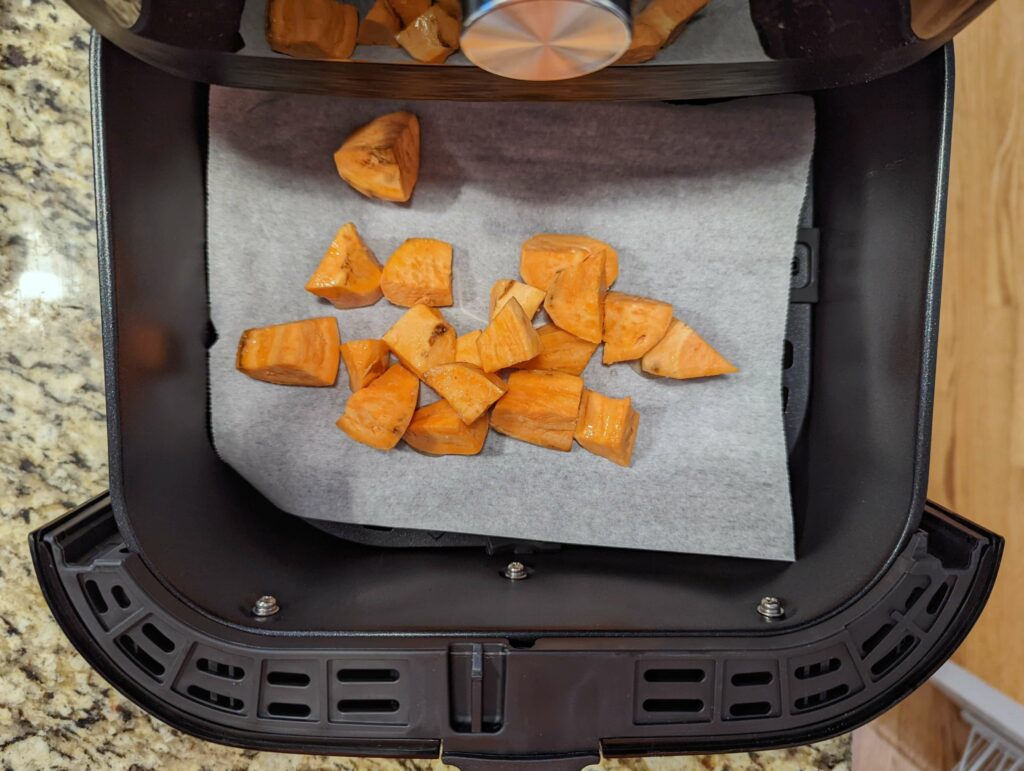 Add them to the air fryer tray.