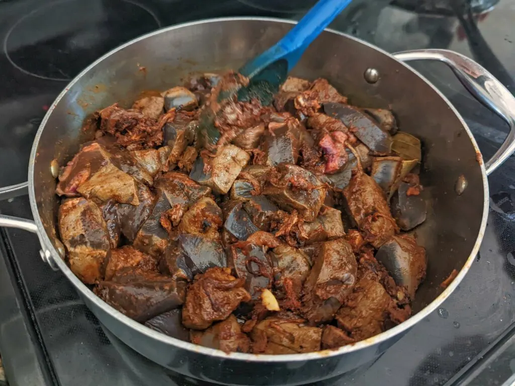 For this kaleji recipe, add the liver and simmer.