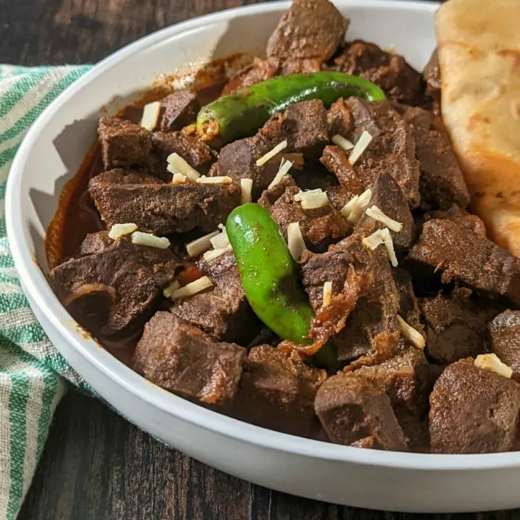Tender chunks of beef liver topped with chilis and ginger.