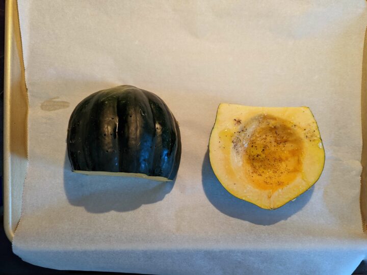Season the squash and set it on a rimmed baking sheet.