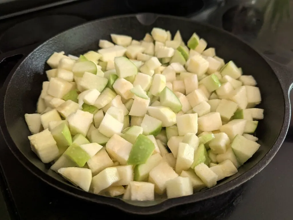 Apples cooking in a skillet. 