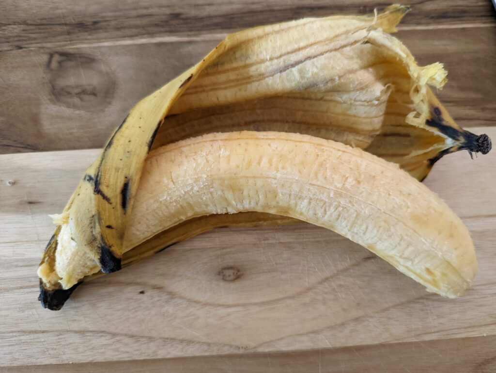 The peel of a plantain removed.