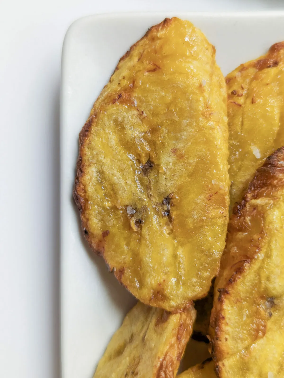 A close up of an air fried plantain.