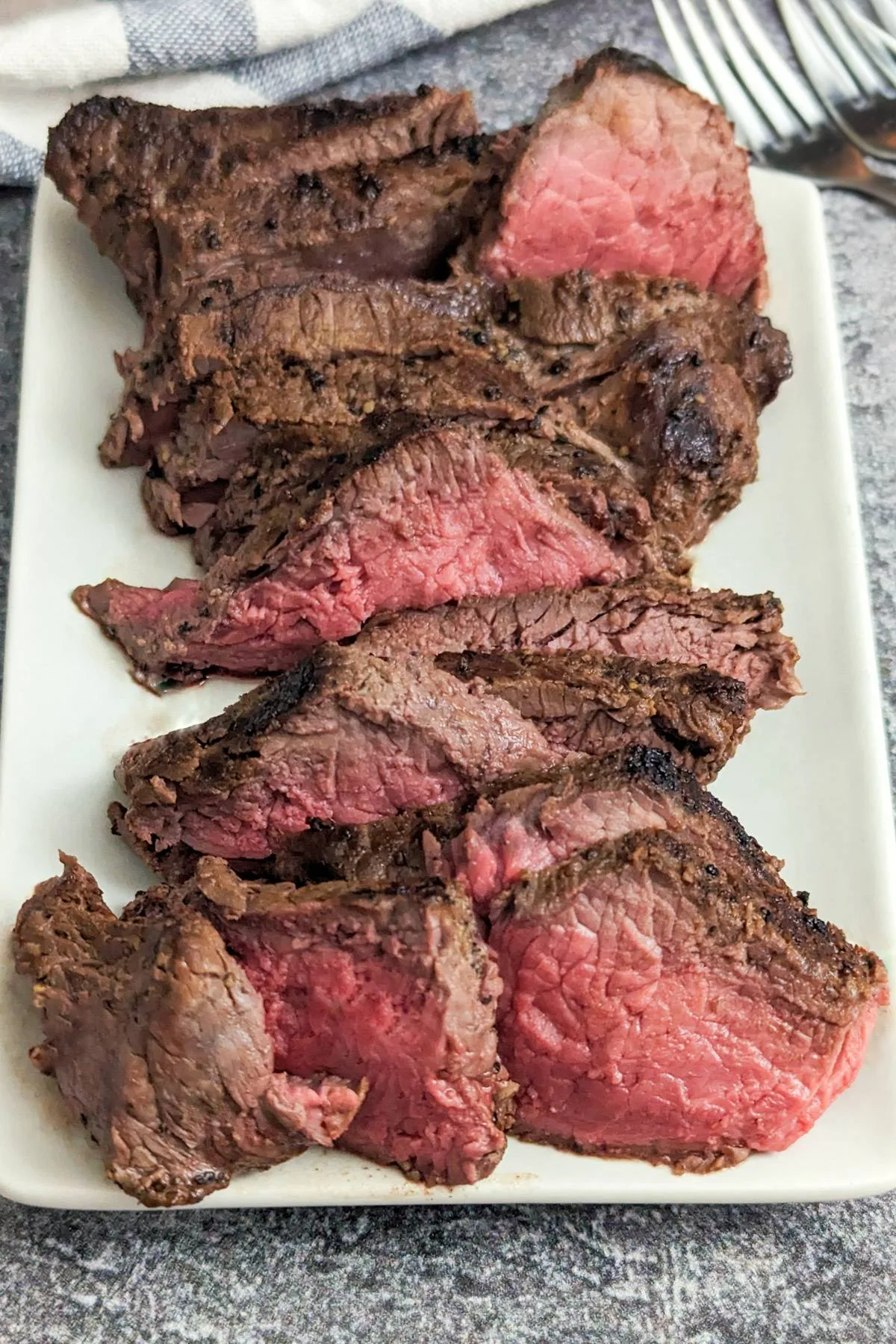 A sliced bison steak.