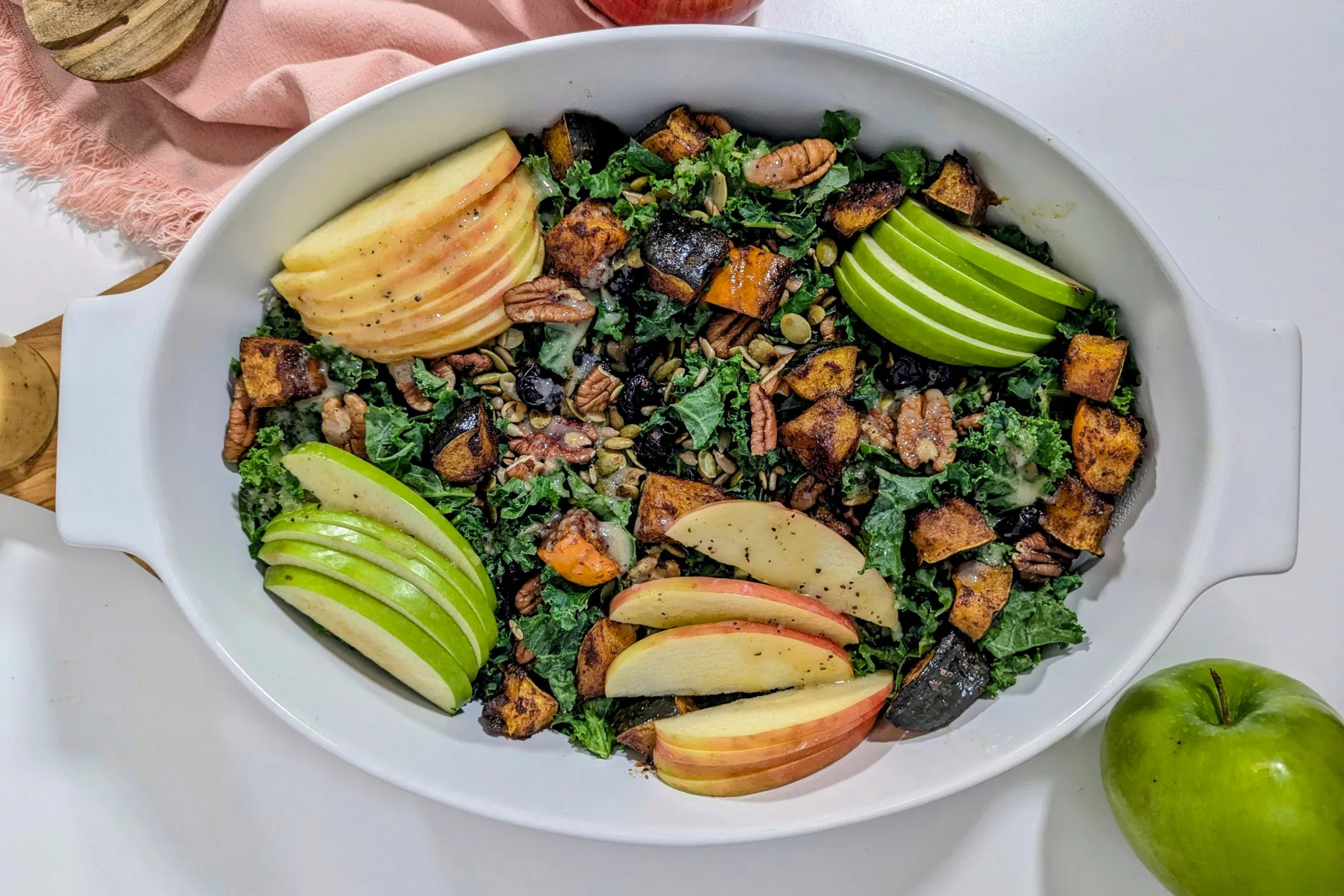 Fall kale salad in a serving bowl.