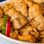 Tandoori chicken tikka in a serving dish.